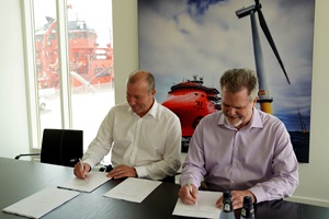 Pictured (left to right): Peter Lytzen, CEO, ESVAGT, and Jeff Andreini, VP, Crowley Wind Services, meet to execute additional joint venture agreements Crowley and Esvagt strengthen venture for US offshore wind vessels
